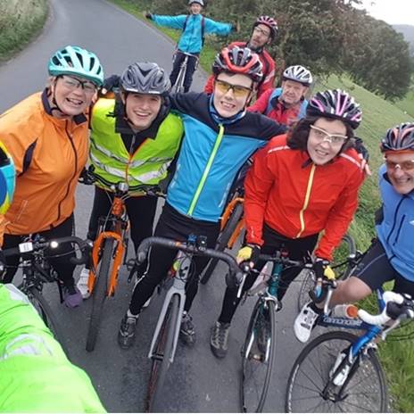 Group selfie of people on bikes