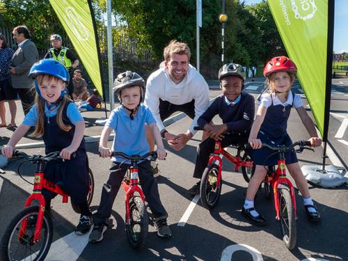 : Leeds United star Patrick Bamford at the official opening of the new Elland Road cycle route with pupils from St Luke’s C of E Primary School, Beeston.